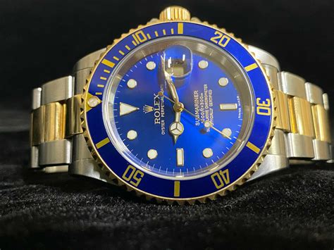 gold and blue rolex price|rolex gold submariner blue face.